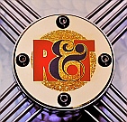 Road & Track Magazine’s Logo on a horn button etched, painted with circular edge hand-chamfered on the &ldquo;Car We Would Most Like To Drive&rdquo; trophy hand-fabricated by Dwight H. Bennett.