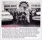 Chrysler’s Chairman Robert Eaton and President Robert Lutz accepting an &ldquo;Automobile of the Year&rdquo; trophy from Automobile Magazine’s David E. Davis with a photo etched plaque by Dwight H. Bennett.