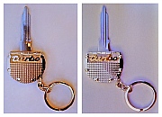 Porsche Turbo 14K Gold next to a Sterling Silver with bronze inset &ldquo;turbo;&rdquo; both Ignition Key Rings utilize factory key blanks, and are both designed and hand-fabricated by Dwight H. Bennett.